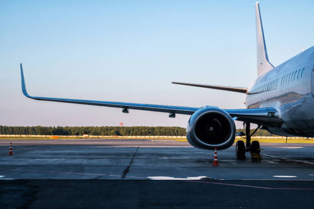 istock White passenger aircraft parked at the airport 863773272