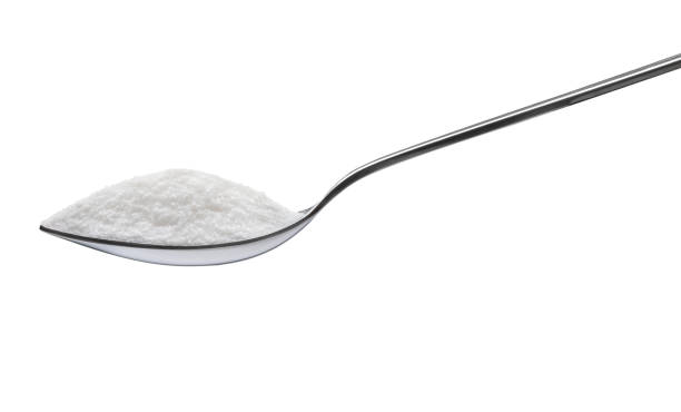 istock Spoon of sugar isolated on white background 863773334