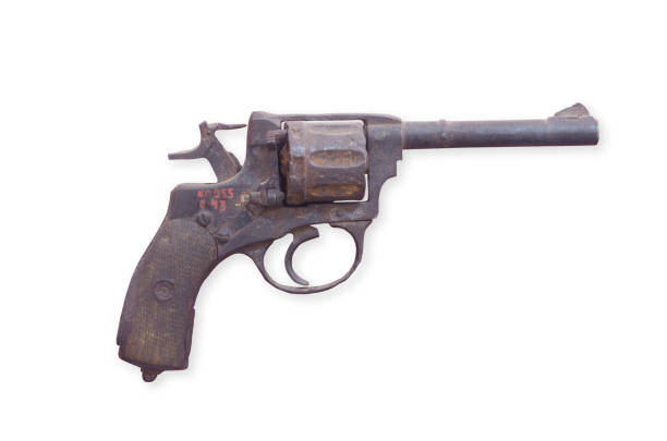 istock old rusty revolver isolated on white. weapons of the Second World War 863779952