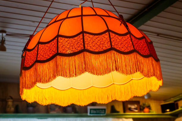 istock Vintage yellow lampshade from the ceiling 863780446