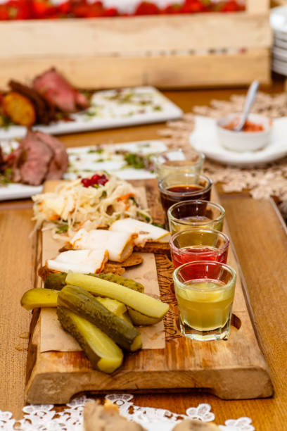 istock Traditional Russian snacks: cabbage, cucumbers and alcoholic drinks are on the table. 863780460
