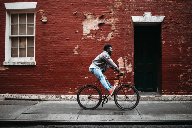 istock Young Man Exploring New York City by Bike 863800940