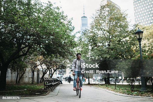 istock Young Man Exploring New York City by Bike 863803074