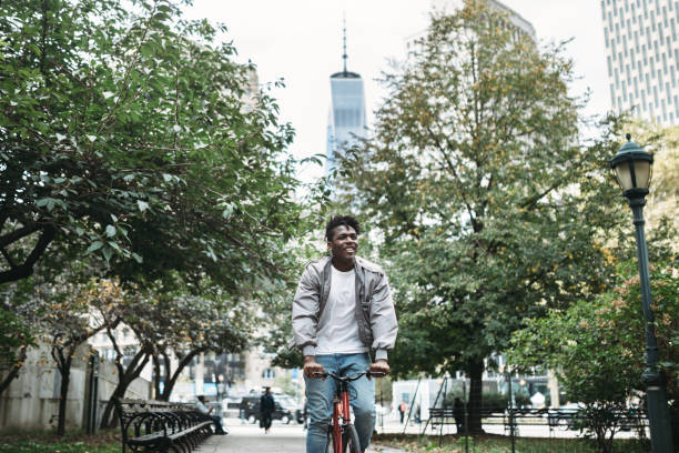 istock Young Man Exploring New York City by Bike 863805152