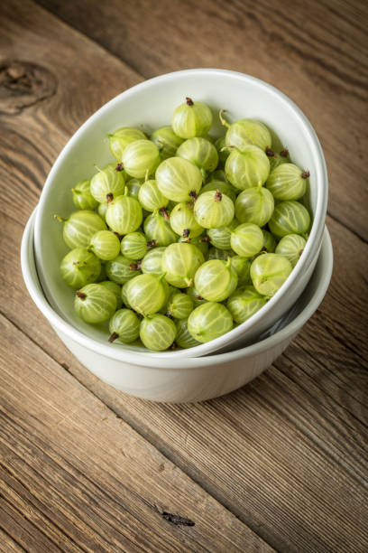 istock Fresh gooseberry in a white bowl. 863822648