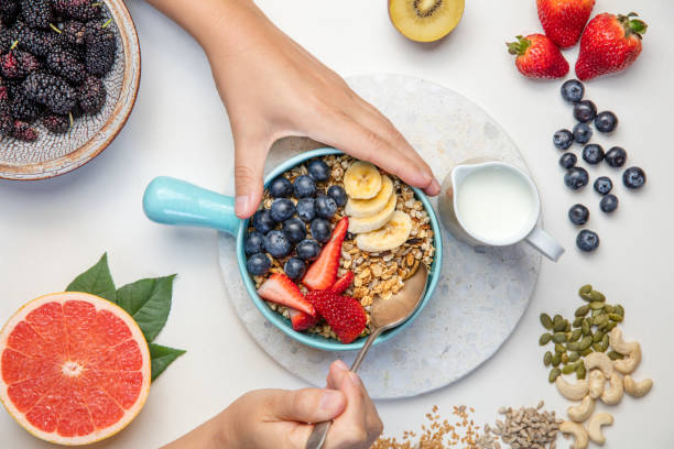 istock Healthy habits - breakfast cereal with fruit 863822930