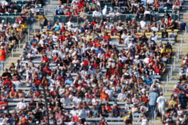istock blured people in stands 863826060