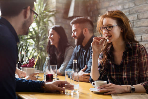 istock Happy colleagues from work socializing in restaurant 863826356