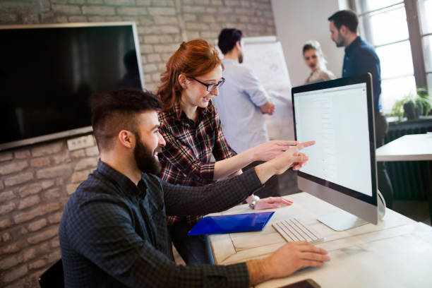 istock Portrait of young designers working on computer 863826904