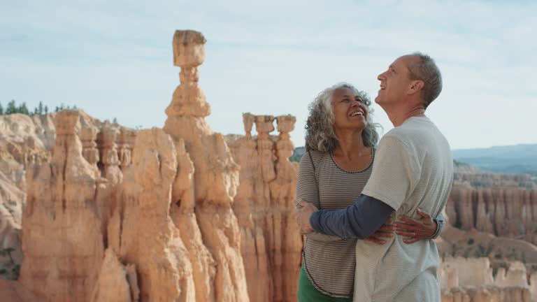 4K UHD: Active Seniors Holding Each Other on the Edge of Bryce Canyon