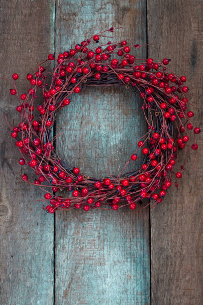 istock Christmas wreath on the wooden background 863830086
