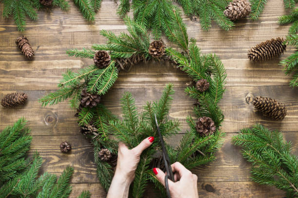 istock Making Christmas wreath using fresh and all natural materials. 863835870