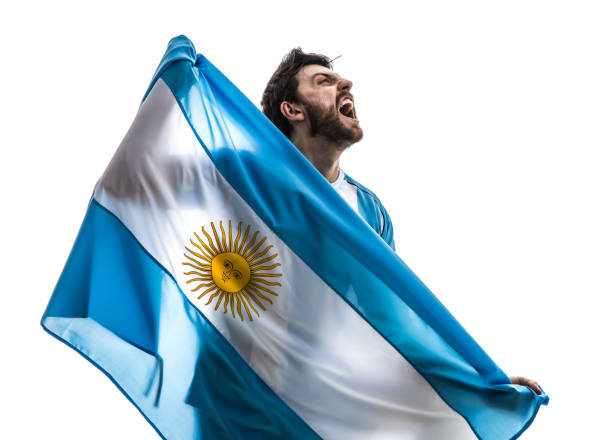 istock Argentinian athlete / fan celebrating on white background 863846242