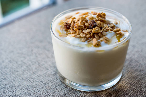 istock Greek Yogurt with Honey and Granola 863860930
