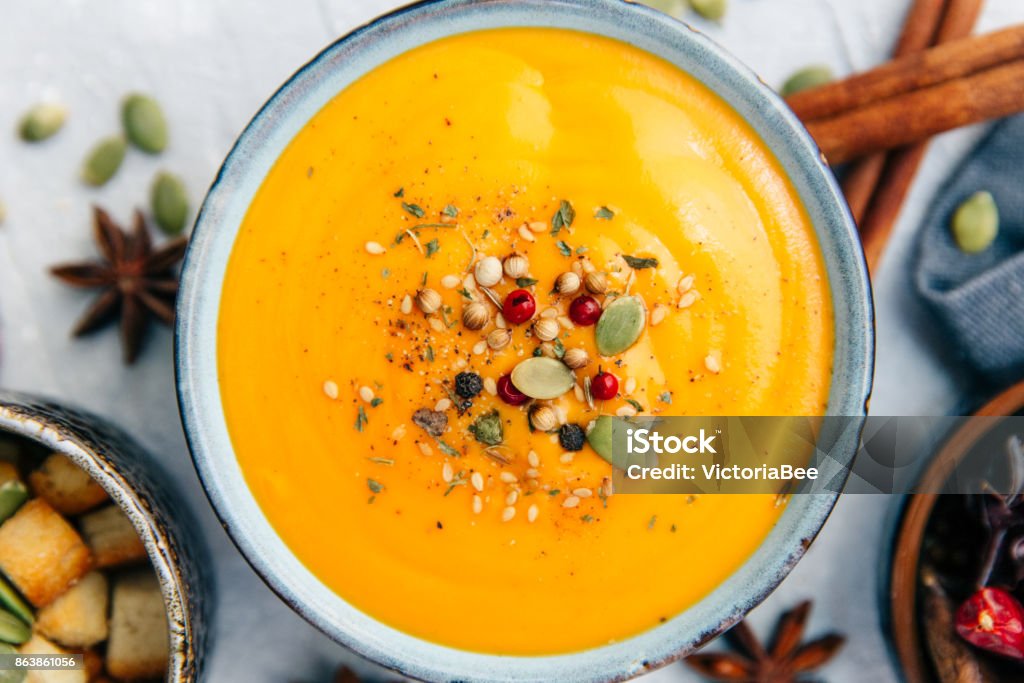 Soup with sweet potatoes, carrots, pumpkin. Flat lay, top view Carrot Soup Stock Photo