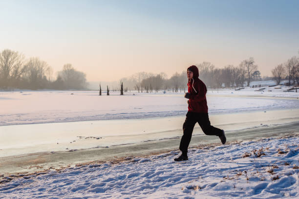 istock Jogging near frozen lake 863861144