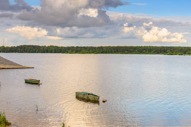 istock Waterscape with a boats at the river at sunset. 863863834