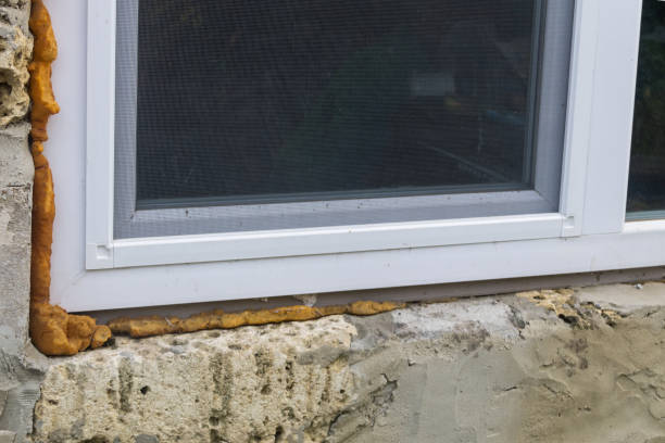 istock Installation with a construction foam of modern pvc window 863863842
