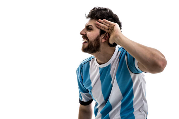 istock Argentinian athlete / fan celebrating on white background 863864080