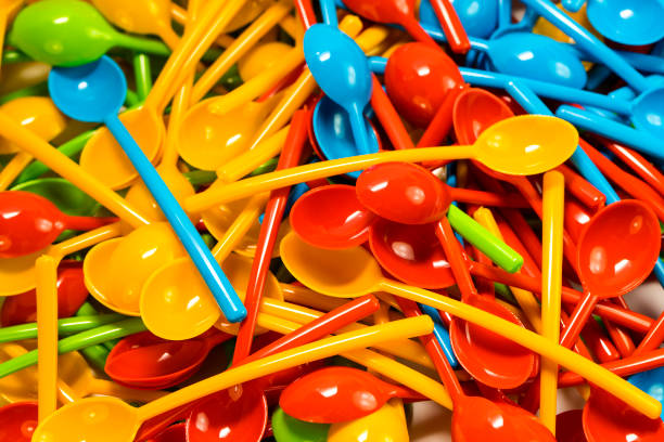 istock Background of many new colored spoons 863864856