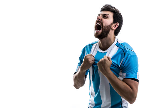 istock Argentinian athlete / fan celebrating on white background 863869570