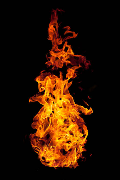 brennende flamme isoliert auf schwarz - flammenmeer fotos stock-fotos und bilder