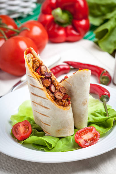istock Burritos filled wiht minced meat, bean and vegetables. 863877914