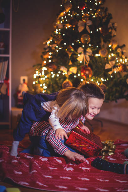 istock Let's open Christmas presents together 863880522