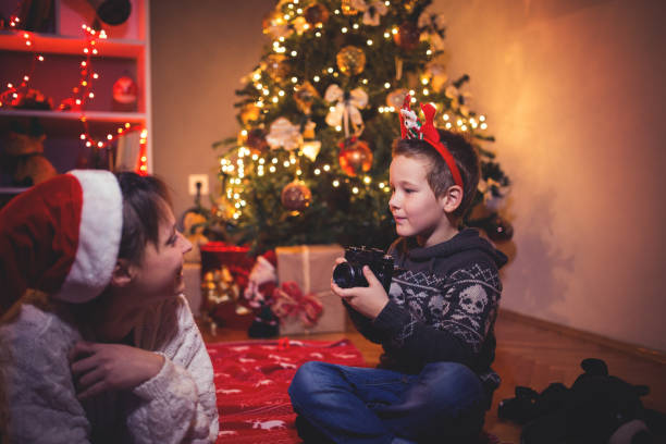 istock Little boy and his mother having fun on Christmas 863884306