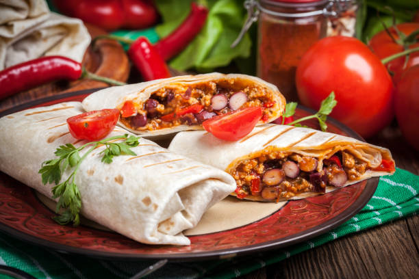 istock Burritos filled wiht minced meat, bean and vegetables. 863884714