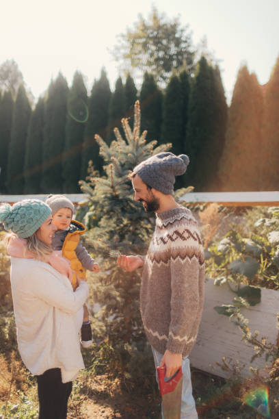 istock Family in a Christmas tree quest 863886828