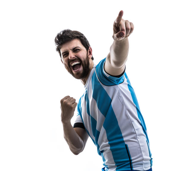 istock Argentinian athlete / fan celebrating on white background 863886964