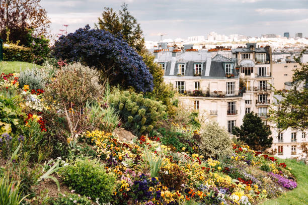 istock Parisian apartment building and park in spring 863890002
