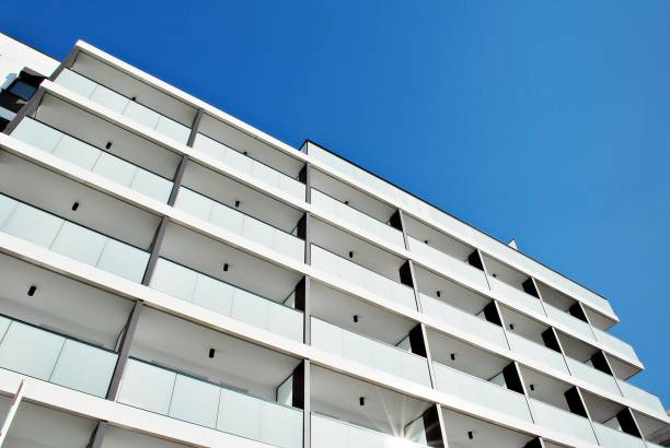 istock Modern, Luxury Apartment Building against blue sky 863909860