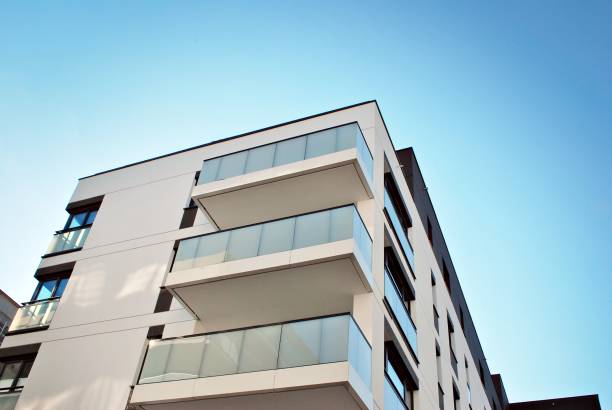 istock Modern, Luxury Apartment Building against blue sky 863909938