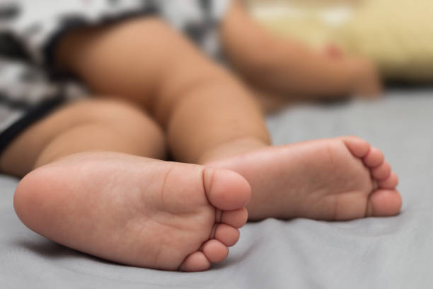 istock Close-up of children's feet. 863978004