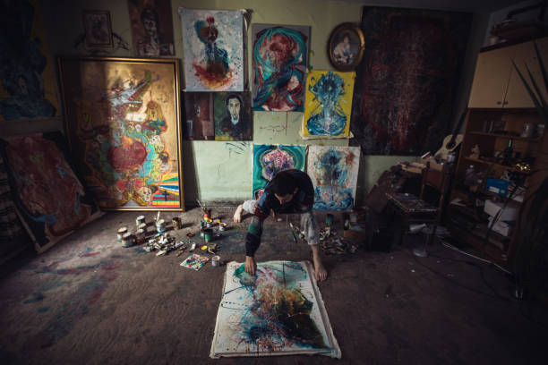 istock Man painting all day 863993896
