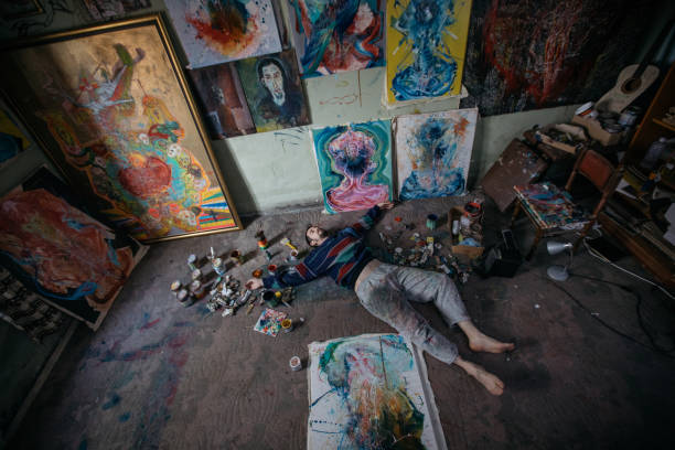 istock Artiist lying on the floor 863994094