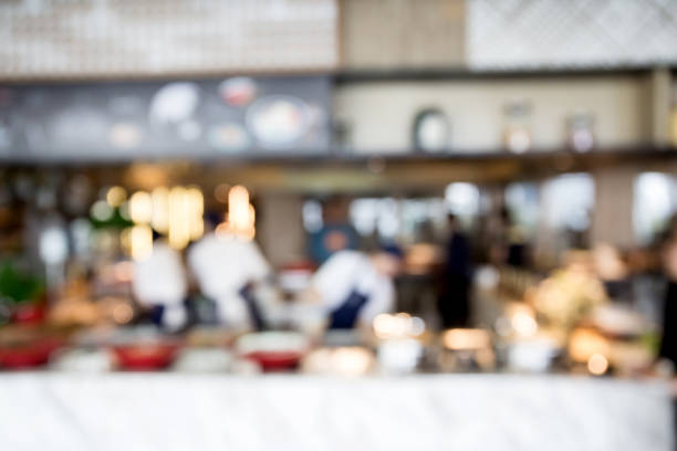 istock Blur abstract bokeh light background with restaurant or coffee shop or pub modern luxury style with people celebrate and dinning warm tone. For create montage product display. 863998840