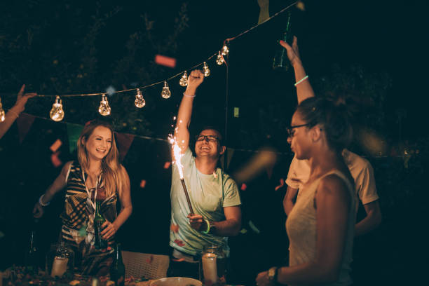 istock Friends having fun at backyard party 864001650