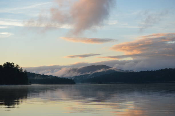 istock Sunrise over Saranac Lake with Mountain Reflection 864004714