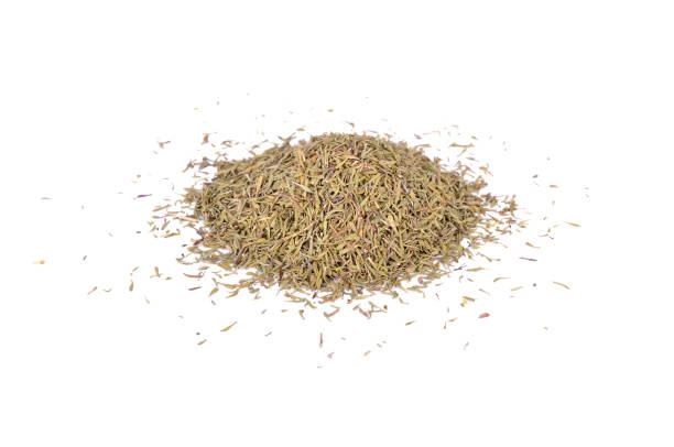 istock pile of dried thyme leaves on white background 864012362