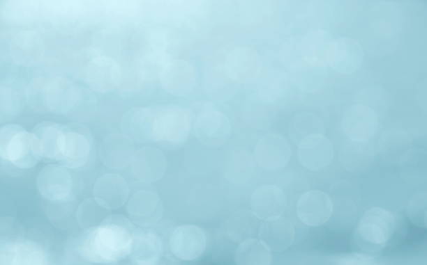istock Abstract blue color blurred bokeh light / water reflection for background 864029668