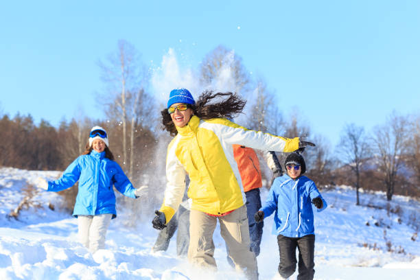 istock Friends having fun with snow balls 864037466