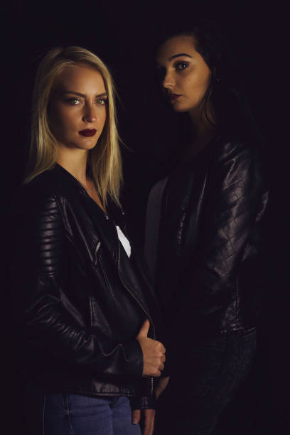 istock Book cover. Two beautiful vampires girls 864038026