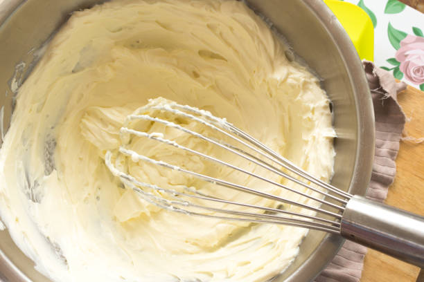 istock whisk,cream cheese and whisk in metal bowl preparing for bake cake 864050148
