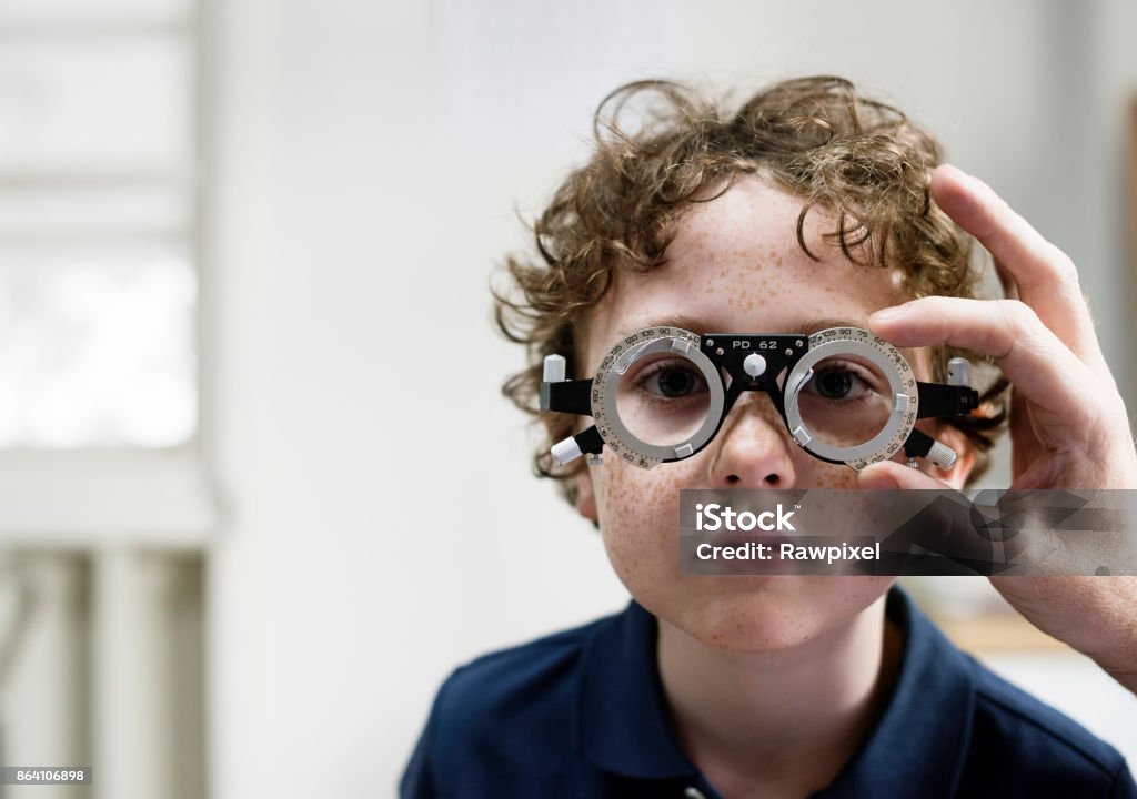 Little boy getting his eyes checked Child Stock Photo