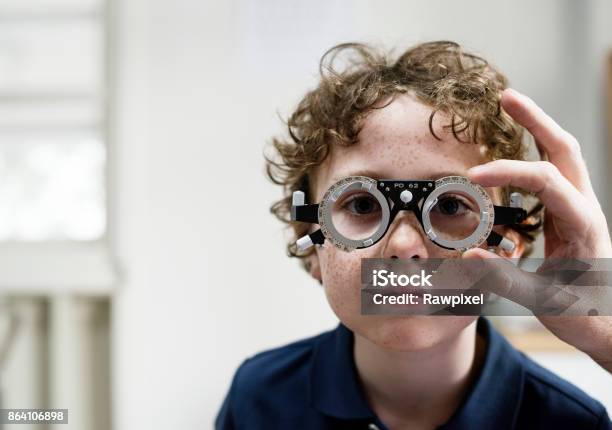 Little Boy Getting His Eyes Checked Stock Photo - Download Image Now - Child, Ophthalmologist, Optometrist