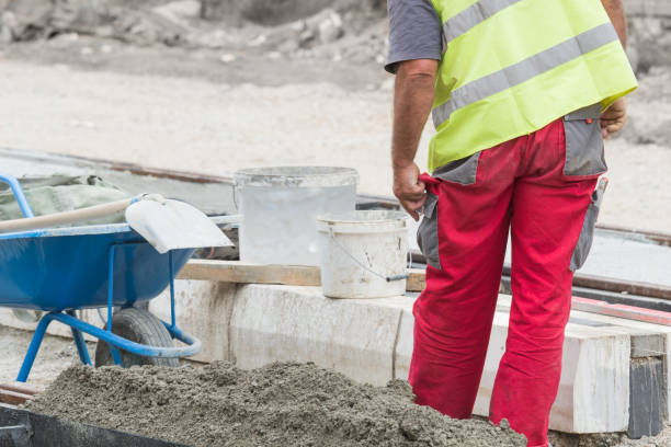 istock Hard working construction industry - man with a shovel. 864119394