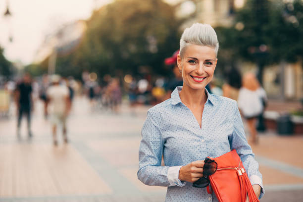 istock Beautiful elegant middle aged woman 864124398